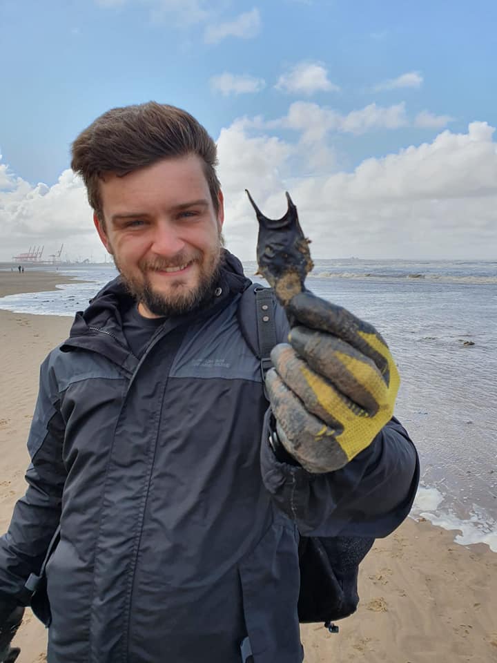 Donovan with a shark's egg (Mermaid's Purse)